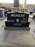 COMPANION JET BLACK UPRIGHT HEADSTONE WITH VASES